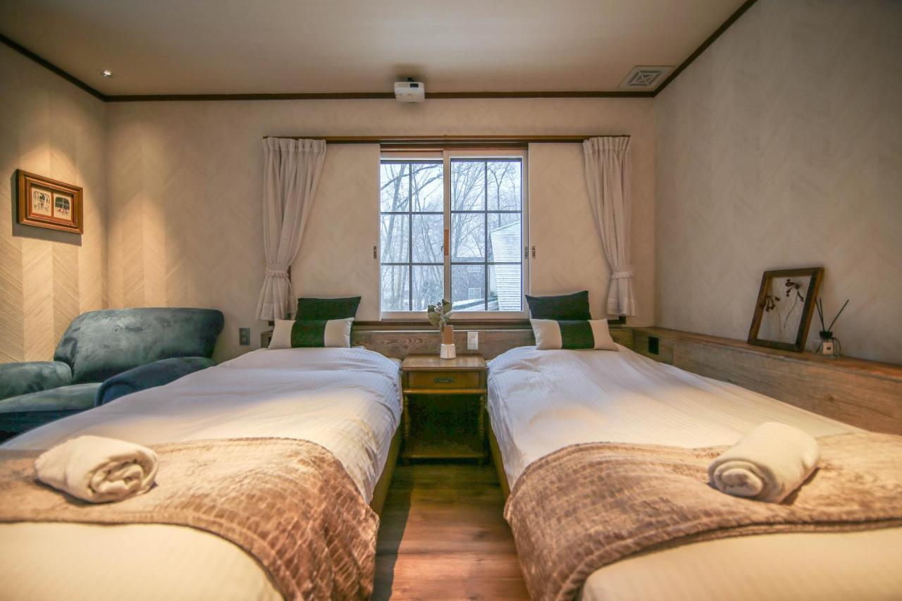 Apricot Pension Hakuba Buitenkant foto